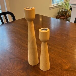 Blond turned-wood candle holders